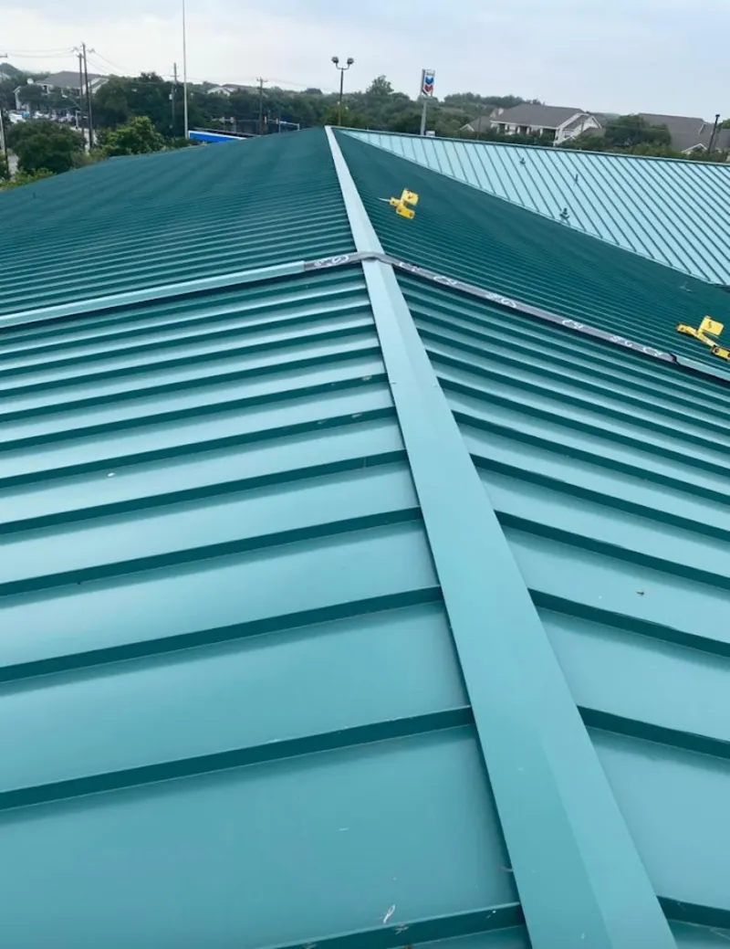 Green commercial metal roof ridge and valley for Metal Roof Repair in Holyoke